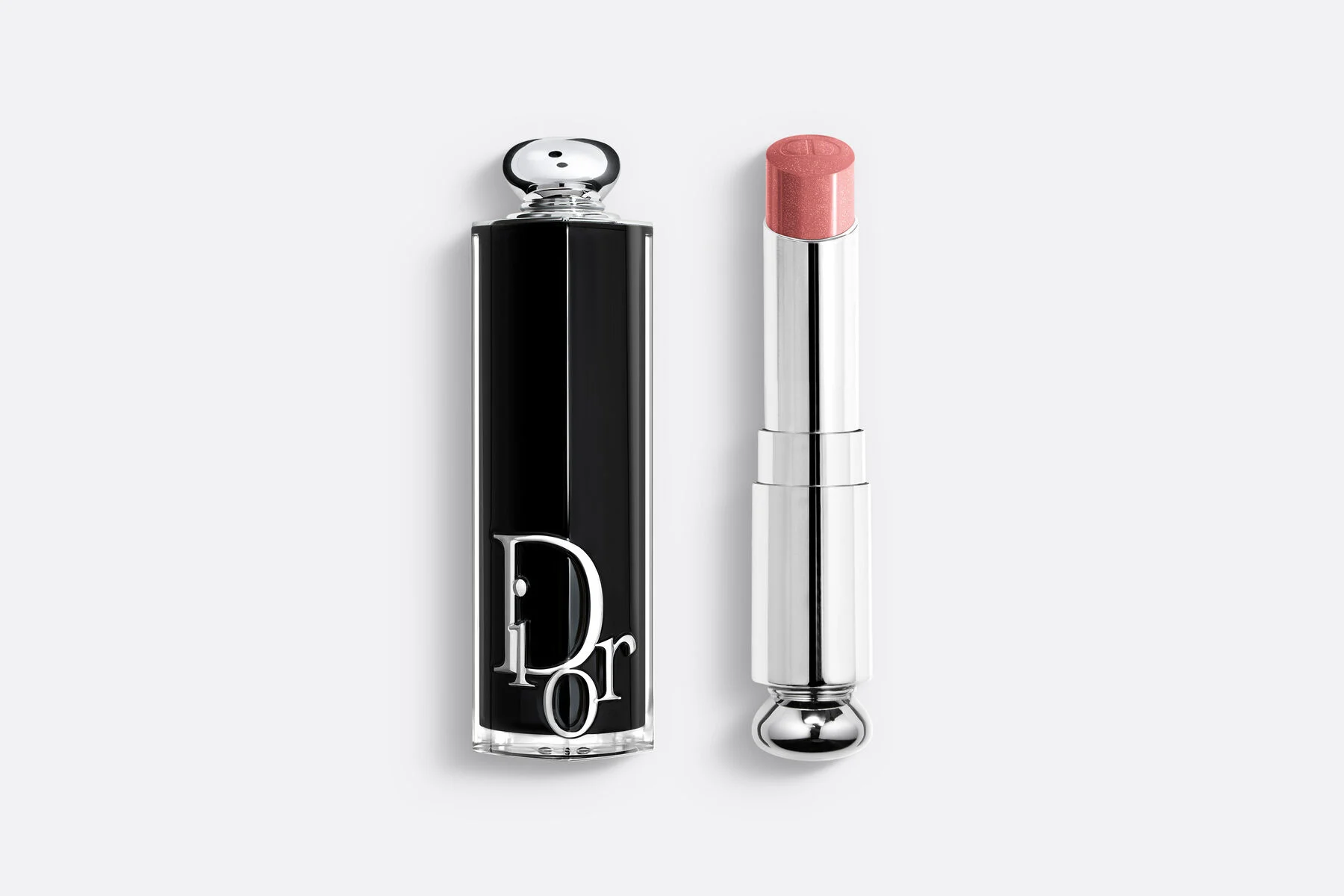Dior Addict Lipstick in Shade 329, a peachy nude with a satin finish.