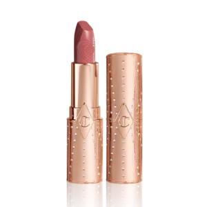 Charlotte Tilbury Wedding Belles lipstick in a soft rose-pink with a matte finish.